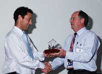 AILU President Tim Holt (left) presenting the Award to Tim Willford on behalf of Phil Rumsby