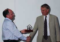 AILU President Tim Holt (left) presenting the Award to Malcolm Gower 